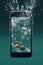 waterproof smartphone submerged in water with bubbles