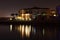 Waterside buildings at night