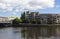 The waterside development of modern Belfast City with it`s high Rise buildings around the Queens bridge and the River Lagan at Don