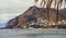 Waterside distant view to Playa de Las Teresitas beach picturesque famous place for tourists, hillside town houses mountainous