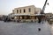 Waterside restaurants in early evening light at Old Venetian Harbor in Rethymnon.