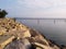 Waterside stone embankment path in winter.