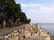 Waterside stone embankment path in winter.