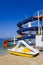 Waterslide and catamaran on beach