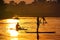 Watersports athlets at sunset wakeboarding and SUP