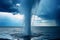 A waterspout tornado lifting water jets from the ocean surface