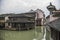 Watertown. Channel with buildings on water. Zhouzhuang