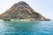 Watery Island `Turkish say Suluada`, the white-orange cliffs of the island.