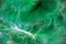 Watery, marbled emerald green texture perfect for backgrounds