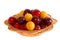 Wattled dish with plums