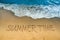 Wave of blue sea on sandy beach. The text Summer Time written in the sand. amazingly beautiful sea landscape with Summer Word