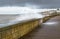 Wave crashed over sea wall in Herne Bay, Kent, Uk