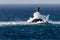 Wave crashing over Longships Lighthouse