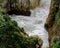 Wave crashing at The Pancake Rocks at Punakaiki, Greymouth, West Coast, South Island, New Zealand