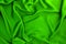 Wave green silk or satin fabric background