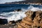 Wave Hitting Rocky California Coastline