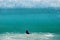 Wave passing over a man at Main Beach, Laguna Beach, California.