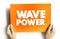 Wave Power is the capture of energy of wind waves to do electricity generation, water desalination, or pumping water, text concept