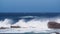 Wave under blue sky at Cape Point in South Africa