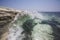 Wave and white rock near Governor`s beach, Cyprus. Sea landscape