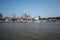 Waveless calm water surface and Hamburg harbor skyline with modern buildings along the Elbe river