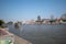 Waveless calm water surface and Hamburg harbor skyline with modern buildings along the Elbe river