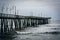 Waves in the Atlantic Ocean and the Fishing Pier in Virginia Beach, Virginia.