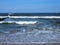 Waves on the beach, tides. Waves breaking on beach in Poland