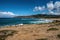 Waves are beating against rocky shore of sea on sunny summer day