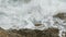 Waves beating on the rocks on the beach in Montenegro