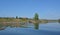 Waves and blue sky reflection in the water