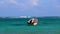 Waves boats caribbean coast and beach panorama view Tulum Mexico