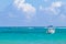 Waves boats caribbean coast and beach panorama view Tulum Mexico