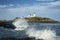Waves Break Around Nubble Lighthouse on a Summer Day in Maine