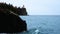 Waves break on shoreline at Split Rock Lighthouse on the north shore of Lake Superior.