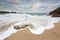 Waves breaking on beach