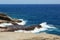 Waves breaking on the cliffs near Lanai Lookout