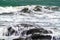 Waves breaking coastal rocks, long exposure