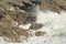 Waves breaking over rocks on the Gower peninsula, Swansea, Wales, U.K., during a winter storms