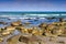 Waves breaking on rocky beach