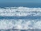 Waves breaking on Sopelana beach in Bilbao