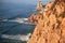 Waves, cliffs and rocks in rays of setting sun on Cabo da Roca, Portugal.