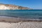 Waves, cliffs, rocks and sand in  Firopotamos beach