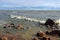 Waves and coastal surf on the sandy beach