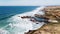 Waves crash against the rocky headlands of the western Portuguese coast on rainy days