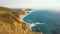 Waves crash along the majestic Pacific coastline of Big Sur in Monterey County