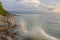 Waves Crash Along A Rocky Lake Huron Shore at Sunset