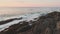Waves Crash On Rocks at Sunrise on Atlantic Coast