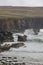 Waves crashing against rocks and sea cliffs, Dingle Peninsula