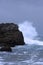 Waves crashing against rocks on a stormy day in Umhlanga South Africa